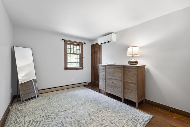 10 Devonshire Ln, South Dennis, MA 02660 - bedroom with an AC wall unit, a baseboard heating unit, and wood finished floors