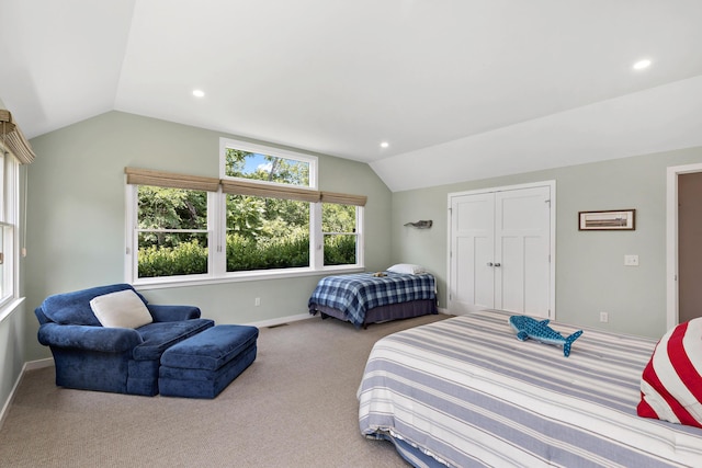 carpeted bedroom featuring lofted ceiling, visible vents, baseboards, and recessed lighting