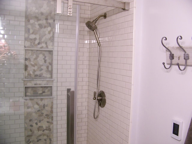 full bathroom featuring a stall shower