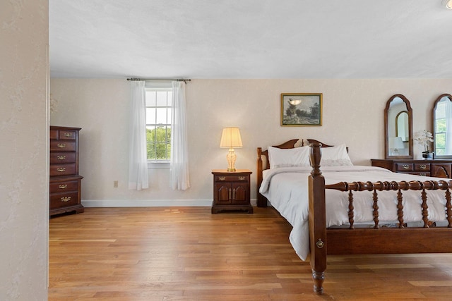10 Briarfield Rd, South Dennis, MA 02660 - bedroom with wood finished floors and multiple windows