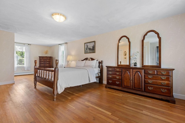 10 Briarfield Rd, South Dennis, MA 02660 - bedroom featuring a baseboard radiator and light wood-type flooring