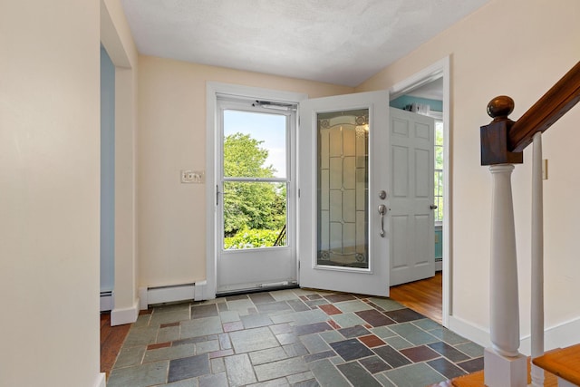 10 Briarfield Rd, South Dennis, MA 02660 - foyer with baseboards and stone finish flooring
