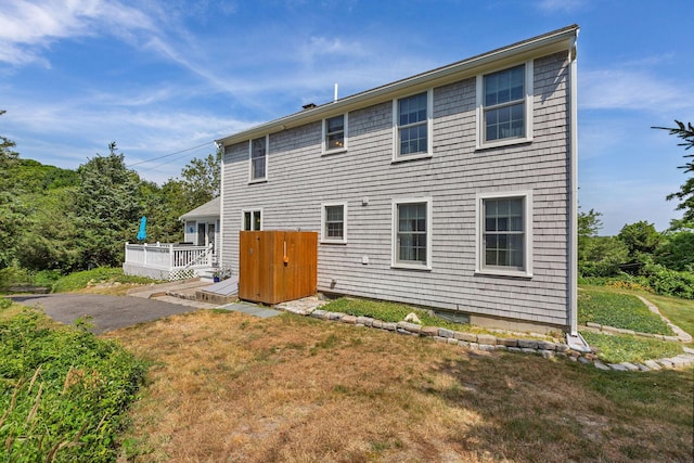 10 Briarfield Rd, South Dennis, MA 02660 - back of house with a deck and a yard