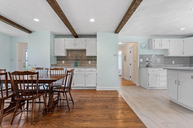 10 Briarfield Rd, South Dennis, MA 02660 - dining area with beamed ceiling, recessed lighting, and light wood-type flooring