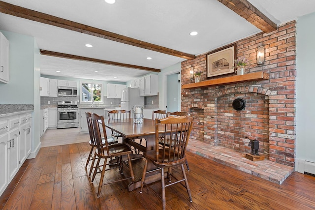 10 Briarfield Rd, South Dennis, MA 02660 - dining space with wood-type flooring, beam ceiling, and recessed lighting