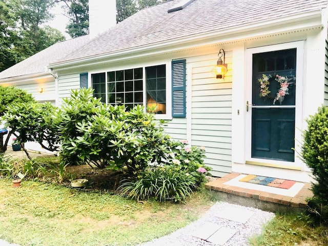 5 Greyhampton Rd, West Yarmouth, MA 02673 - entrance to property featuring a shingled roof and a chimney