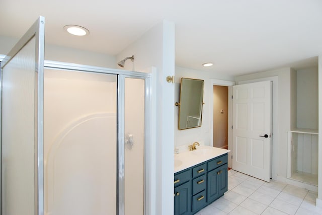 70 Deerfield Ln, Eastham, MA 02642 - bathroom with double vanity, tile patterned floors, and a shower stall
