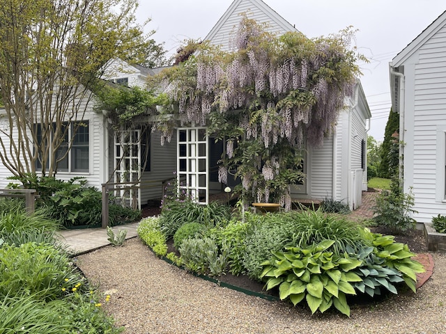 223 Main St, Wellfleet, MA 02667 - rear view of property with french doors