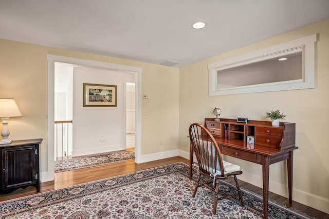 office space with hardwood / wood-style flooring