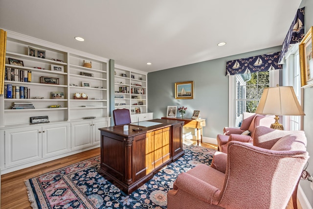 office space featuring wood finished floors, recessed lighting, and baseboards