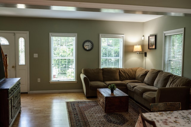 208 Irenes Way, Tisbury, MA 02568 - living room with light wood-style floors and healthy amount of natural light