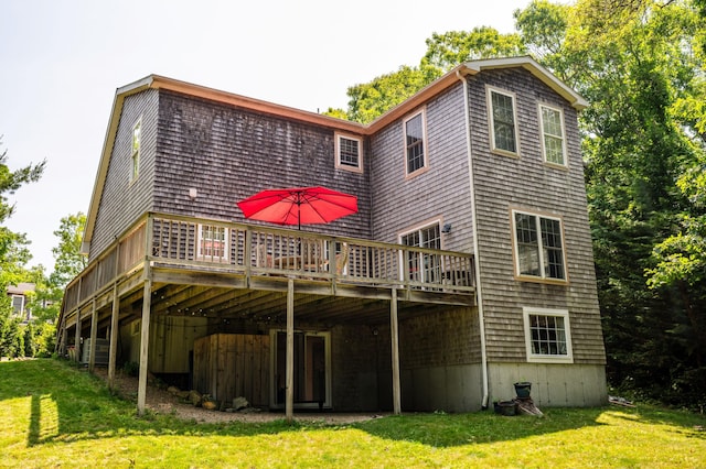 208 Irenes Way, Tisbury, MA 02568 - rear view of house with a wooden deck and a lawn