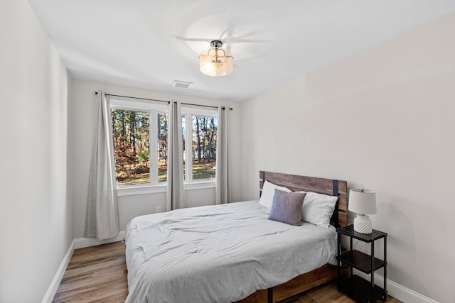 bedroom featuring hardwood / wood-style flooring