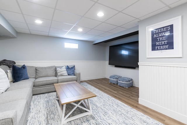 331 Riverview Dr, Chatham, MA 02633 - living room featuring a wainscoted wall, wood finished floors, a paneled ceiling, and baseboards
