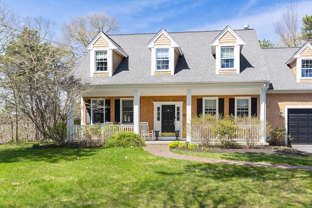 331 Riverview Dr, Chatham, MA 02633 - new england style home featuring covered porch, roof with shingles, a front lawn, and a garage