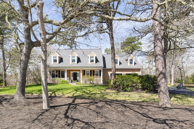 331 Riverview Dr, Chatham, MA 02633 - cape cod home with a porch, a front lawn, and roof with shingles