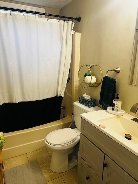 157 Mockingbird Ln, Marstons Mills, MA 02648 - bathroom with vanity, tile patterned floors, and shower / bath combo with shower curtain