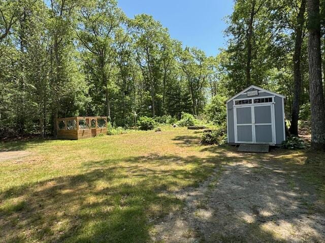 157 Mockingbird Ln, Marstons Mills, MA 02648 - view of grassy yard with a storage shed