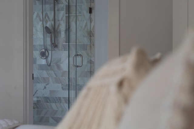 bathroom featuring a shower stall