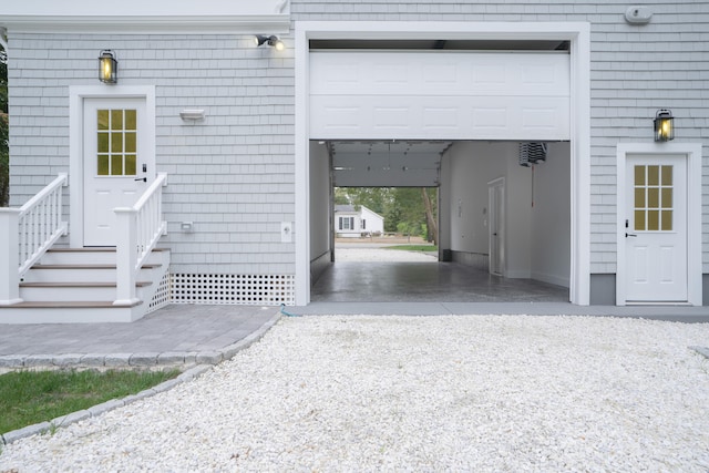 garage featuring driveway