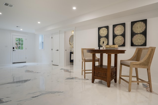 dining room featuring marble finish floor, visible vents, and recessed lighting