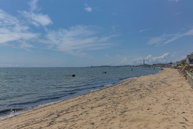 property view of water featuring a beach view