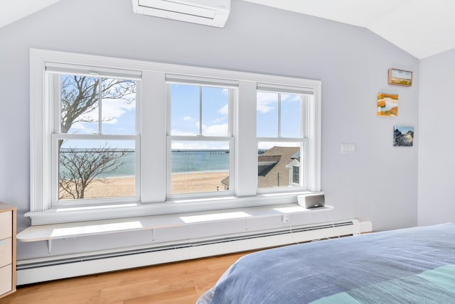 bedroom featuring lofted ceiling, a baseboard radiator, a wall mounted air conditioner, and multiple windows