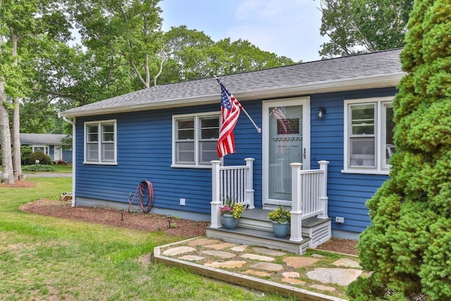 6 Januit St, Sandwich, MA 02563 - view of front of property with a front yard and roof with shingles