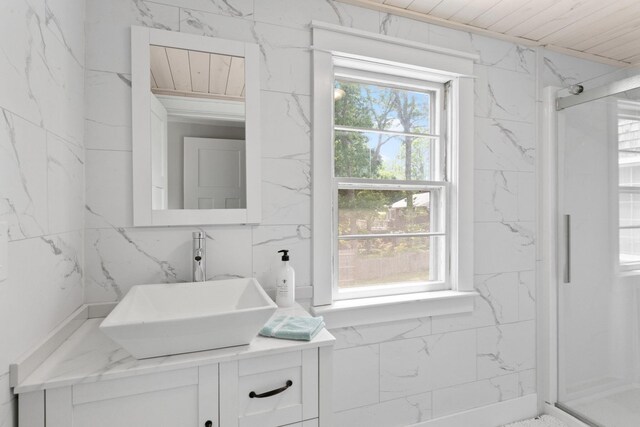 6 Januit St, Sandwich, MA 02563 - bathroom with vanity, a shower, and wood ceiling