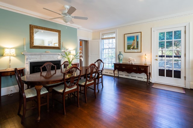 dining area with crown molding, a baseboard radiator, ceiling fan, and dark hardwood / wood-style flooring