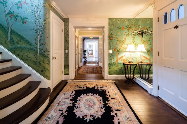 interior space featuring crown molding and dark hardwood / wood-style floors