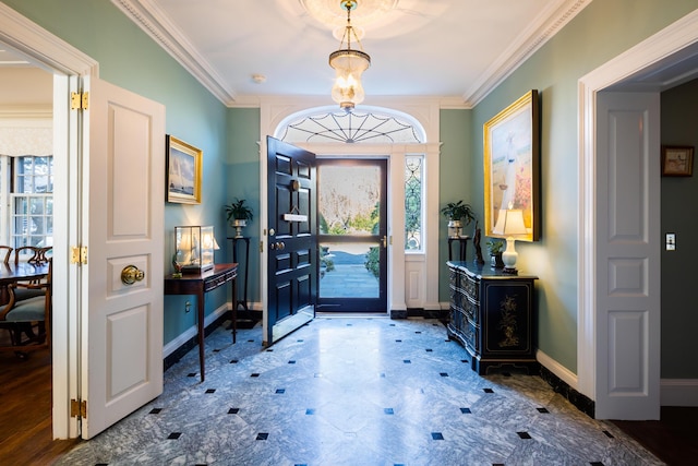 entrance foyer featuring crown molding