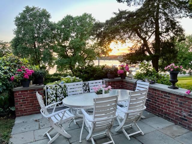 view of patio terrace at dusk