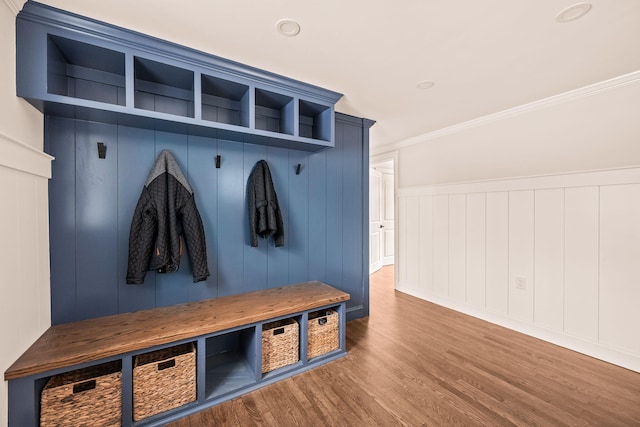 mudroom featuring hardwood / wood-style flooring and ornamental molding