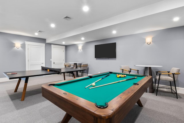 recreation room featuring light colored carpet