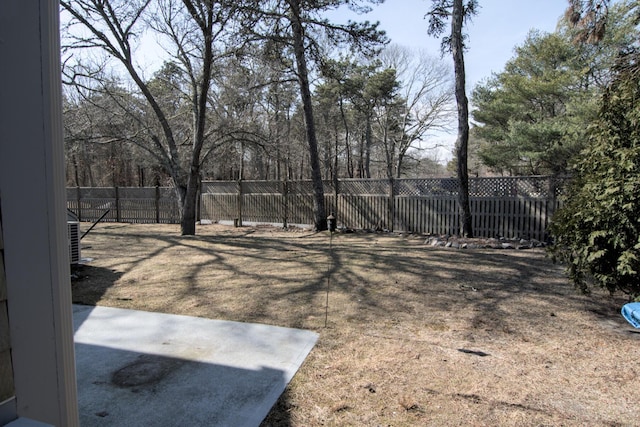 view of yard with a fenced backyard