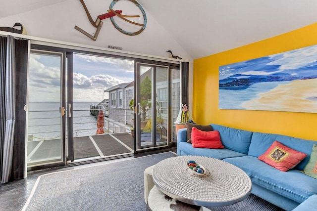 living room with a water view and lofted ceiling