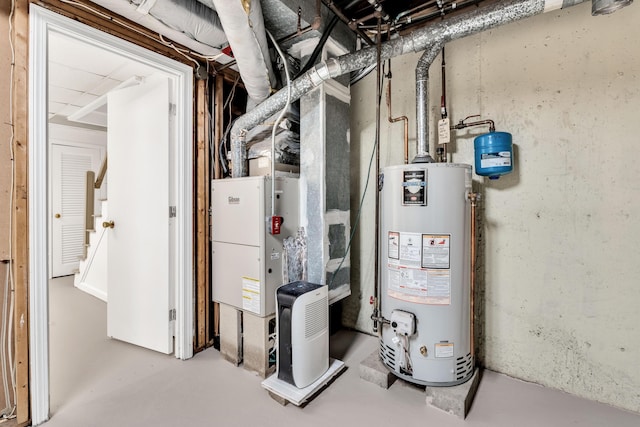 utility room featuring gas water heater