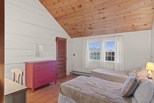 bedroom featuring a baseboard radiator, wood ceiling, light hardwood / wood-style floors, wood walls, and vaulted ceiling