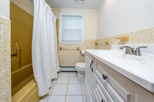 121 S Yarmouth Rd, Dennis, MA 02638 - full bath with a baseboard heating unit, vanity, toilet, tile patterned flooring, and shower / tub combo with curtain