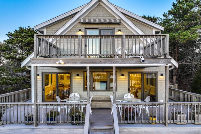 view of front facade featuring a balcony and a porch