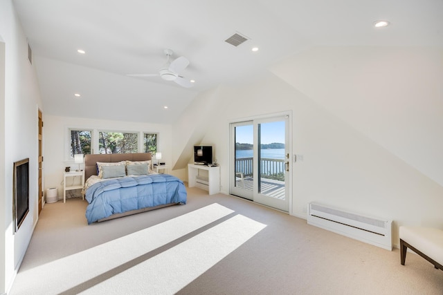 carpeted bedroom featuring lofted ceiling, access to exterior, and ceiling fan