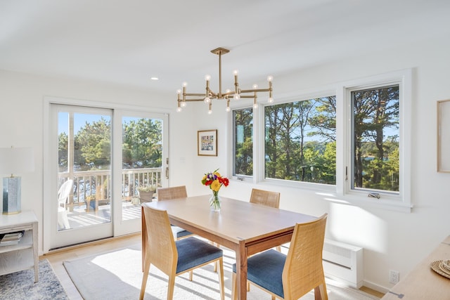 dining area with a notable chandelier