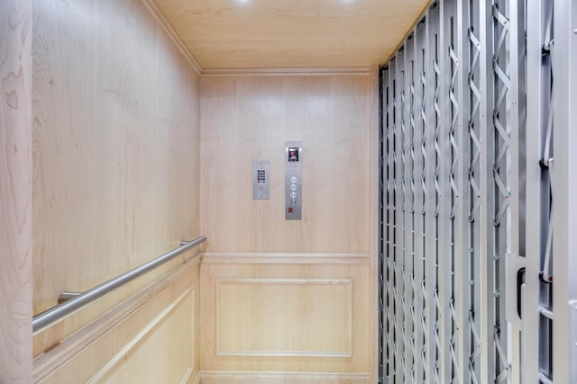 room details with elevator and wood ceiling