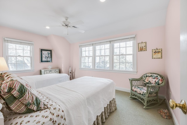 bedroom featuring vaulted ceiling, carpet, a ceiling fan, and baseboards