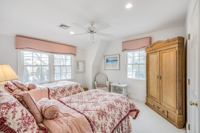 bedroom with recessed lighting, visible vents, a ceiling fan, and light colored carpet