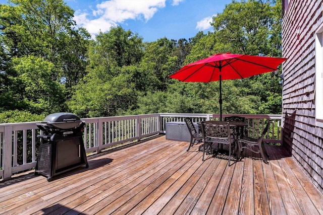 17 Claus Way, Marstons Mills, MA 02648 - wooden terrace with grilling area, outdoor dining space, and central AC unit