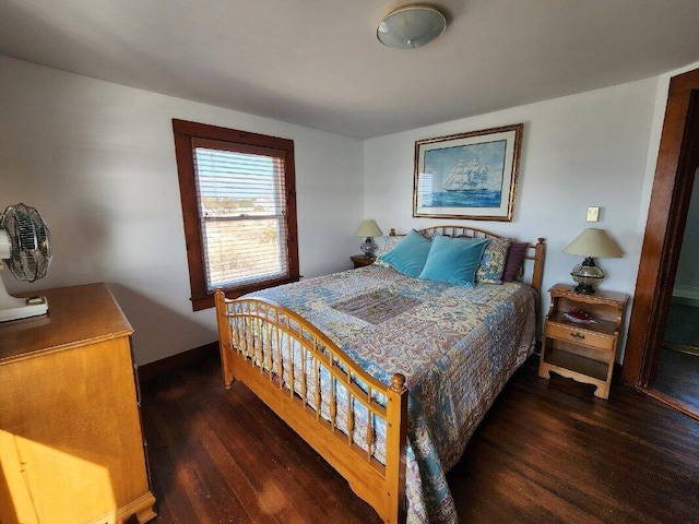 bedroom featuring dark hardwood / wood-style floors