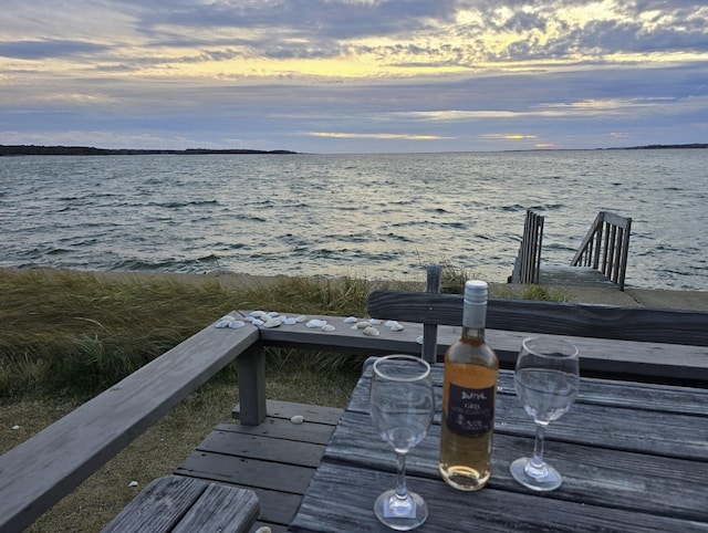 view of dock with a water view