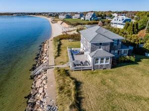 drone / aerial view with a water view